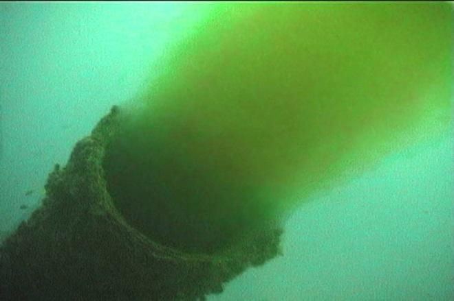 Reef killer 3 Pollution - Uncontrolled seawage outlet into the ocean.  © Marine Photobank